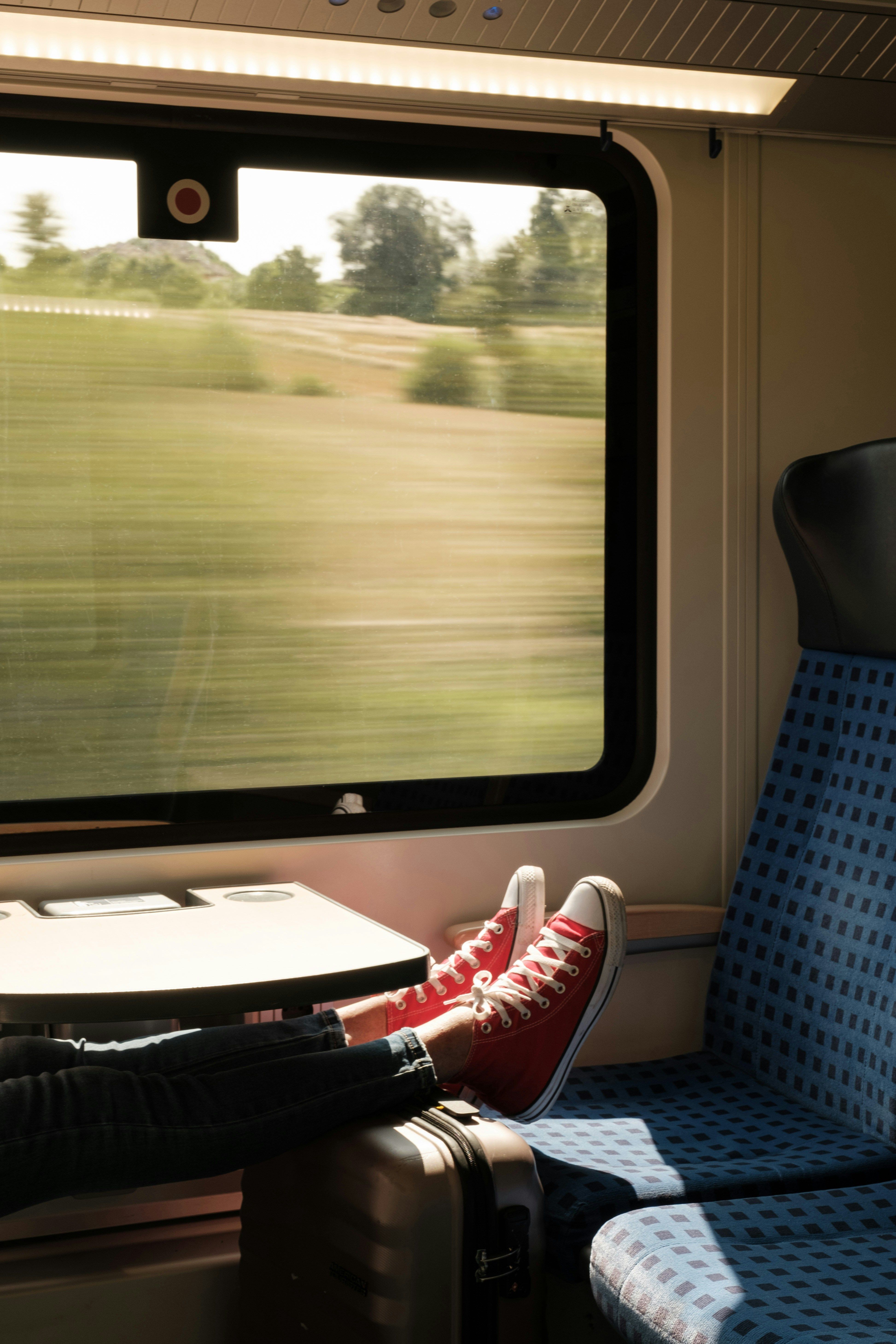 Red Sneakers Ona Train